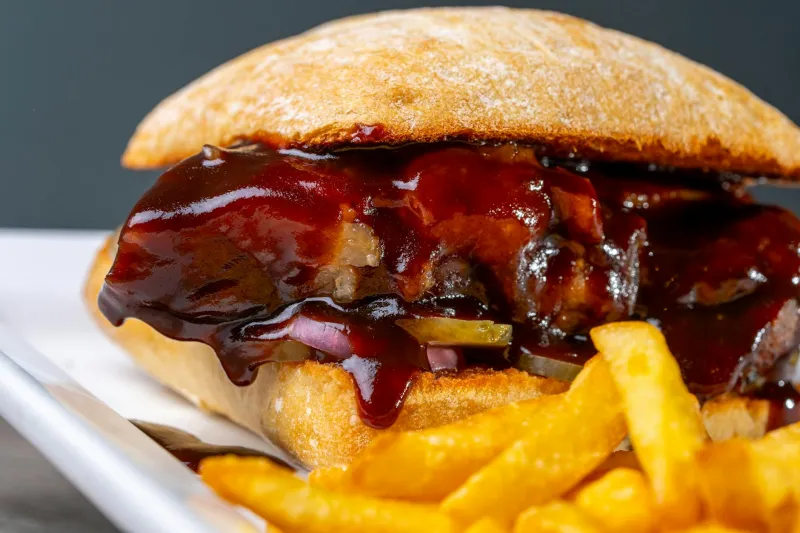 The Failed Sandwich That Mastered the Art of Disappearing: How McDonald's McRib Became America's Most Brilliant Marketing Accident